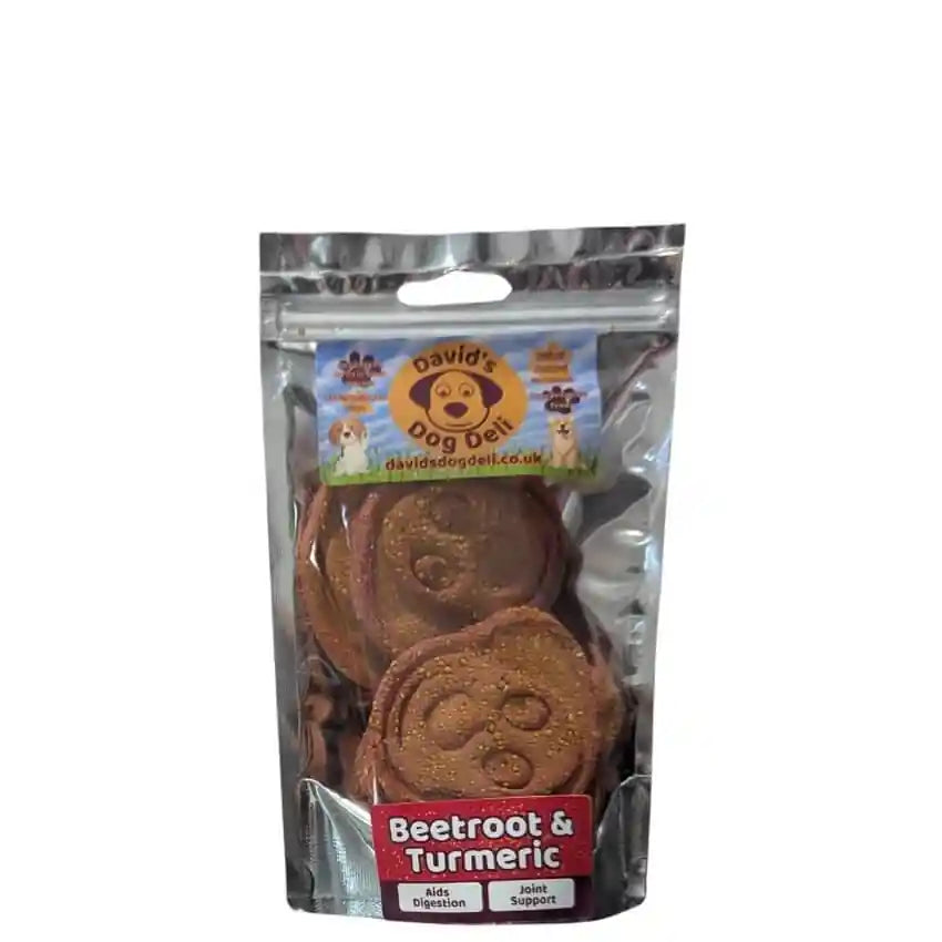 Packaged dog treats with beetroot and turmeric label on a white background
