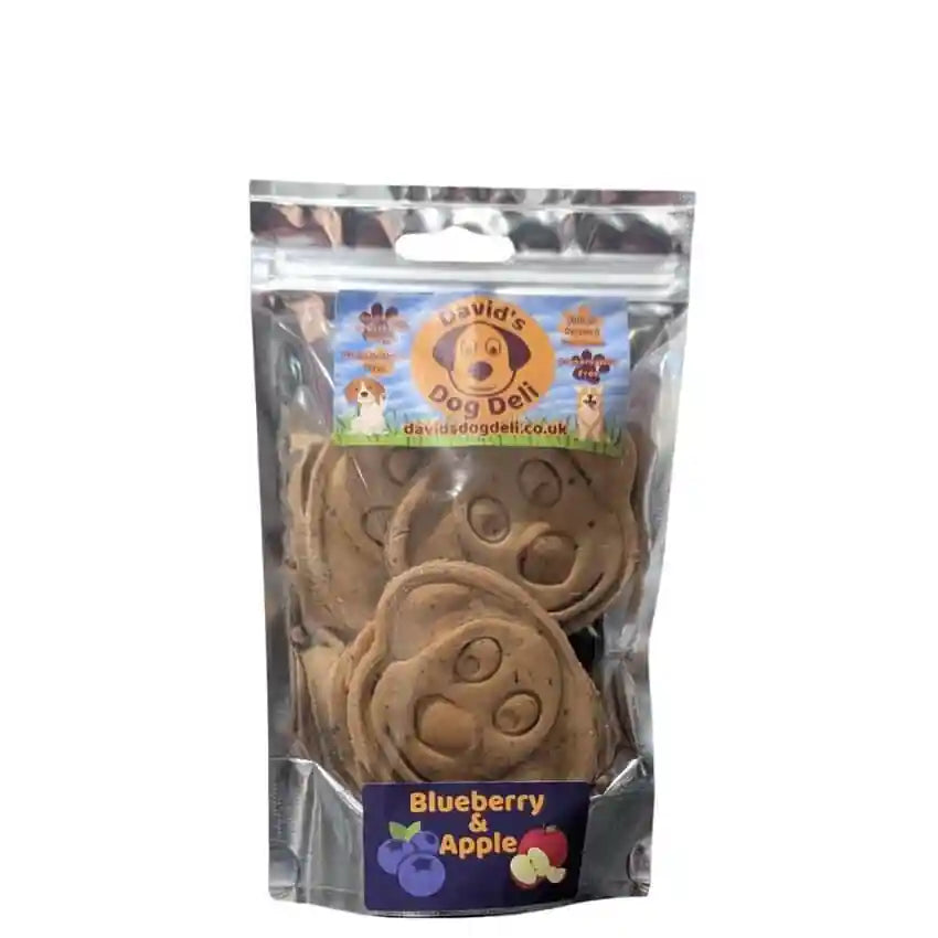 Pack of dog treats with 'David's Dog Deli' branding on a white background