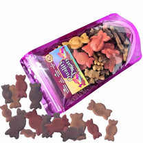 Quality treats in a purple packaging with visible brand label on a white background
