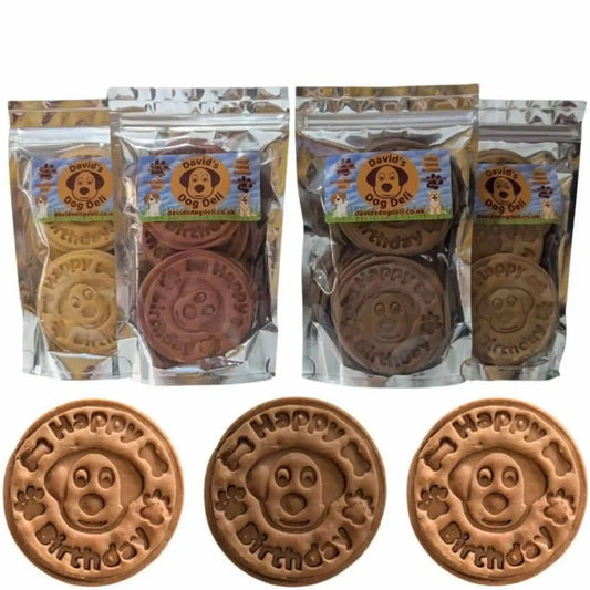 Dog biscuits with 'Happy Birthday' design in clear packaging, branded 'David's Dog Biscuits'.