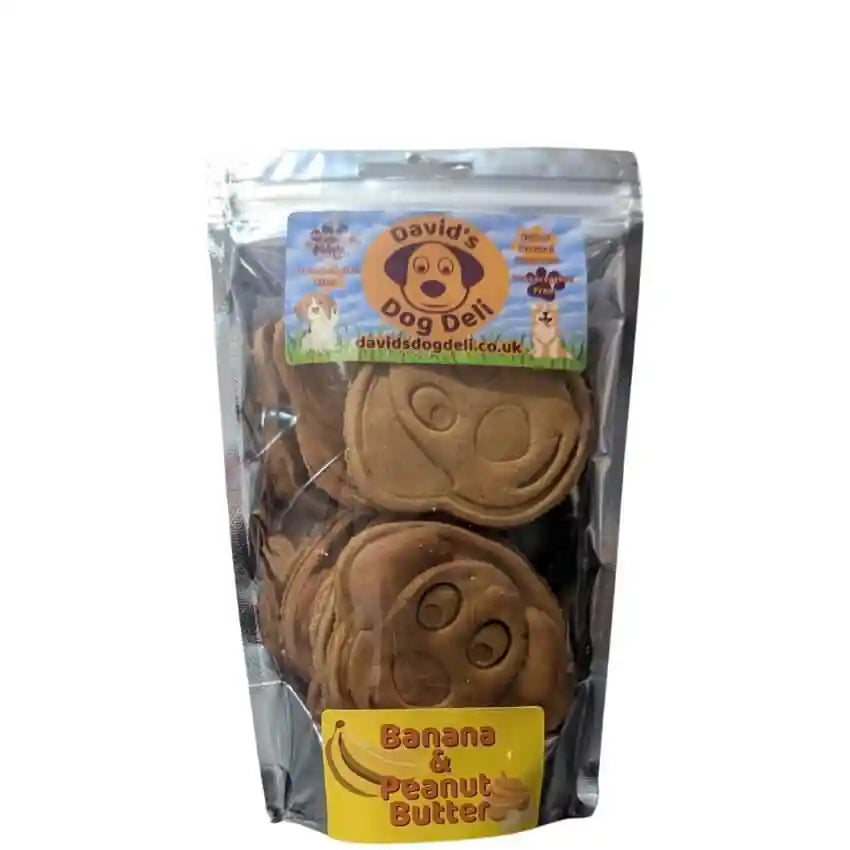 Packaged dog treats with 'David's Dog Deli' branding on a white background